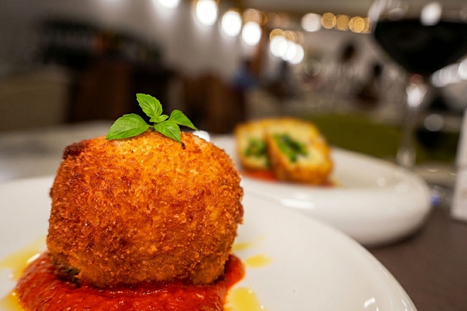 Arancino with broad beans and chicory